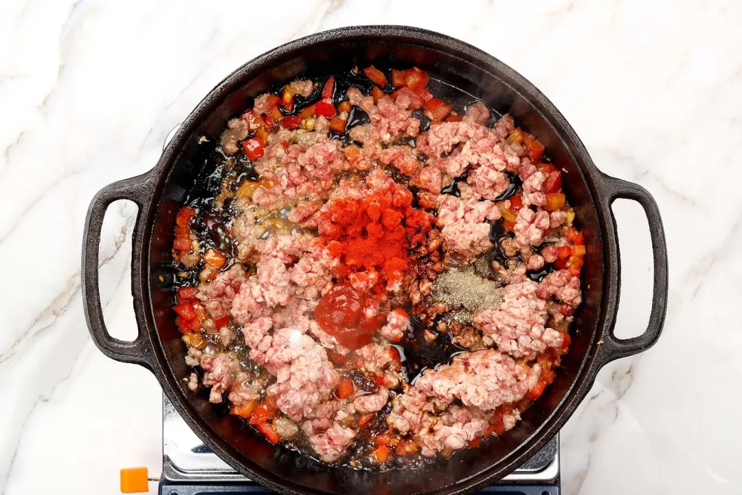 3 Add ground beef and spices to the skillet to brown