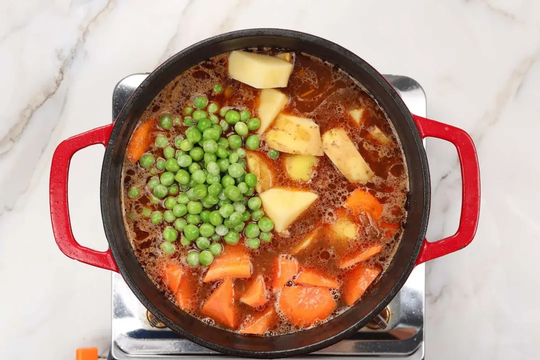 5 Add the vegetables and simmer for another 40 minutes