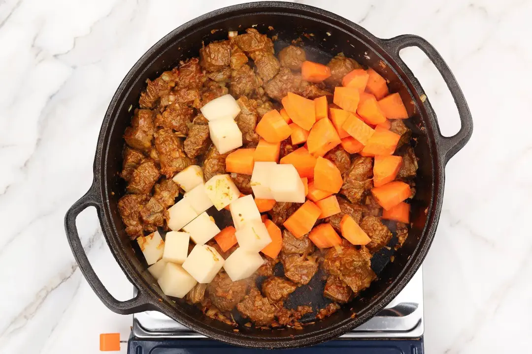 Add the vegetables for beef curry