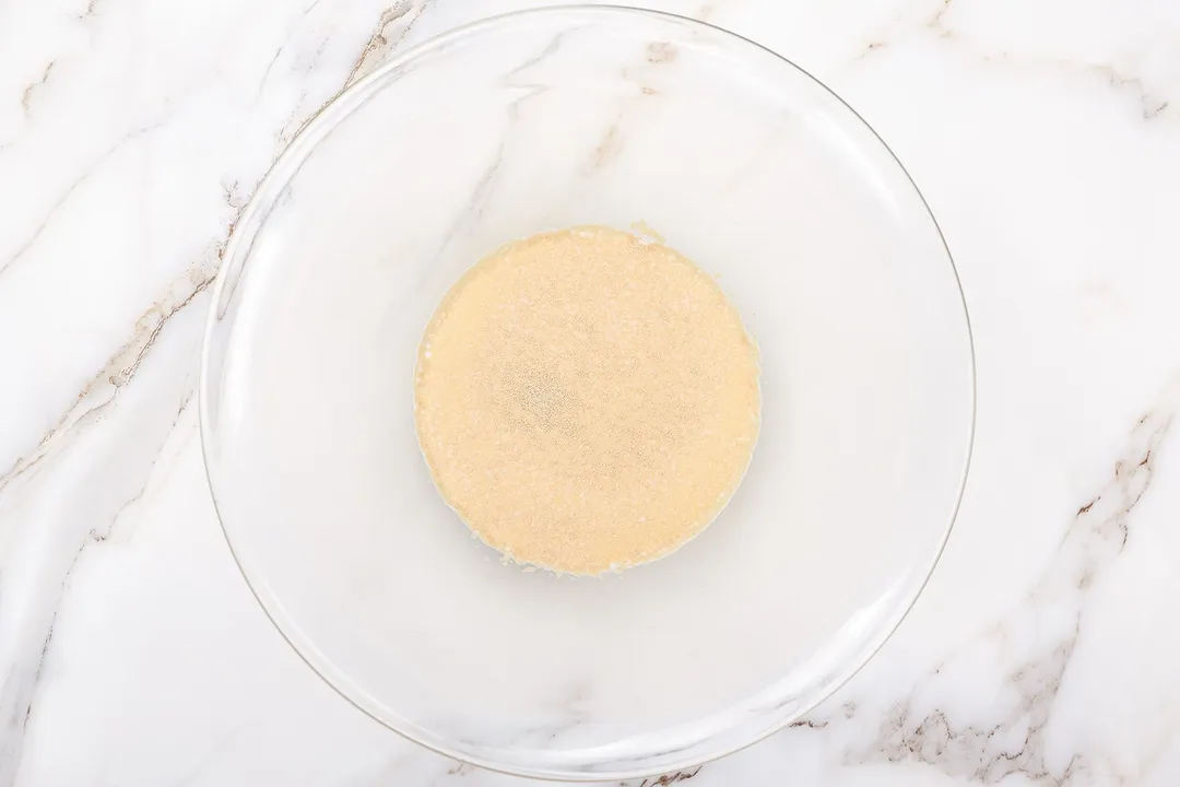 milk and yeast in a glass bowl