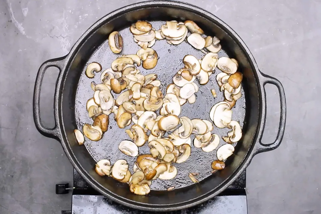 cremini mushroom on a cast iron skillet