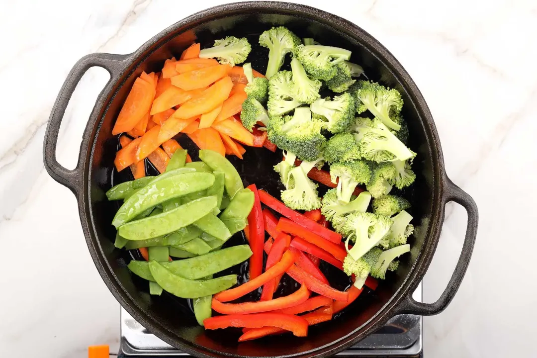 Stir fry the vegetables for beef stir fry