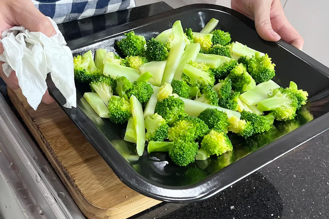 broccoli florets on a baking sheet