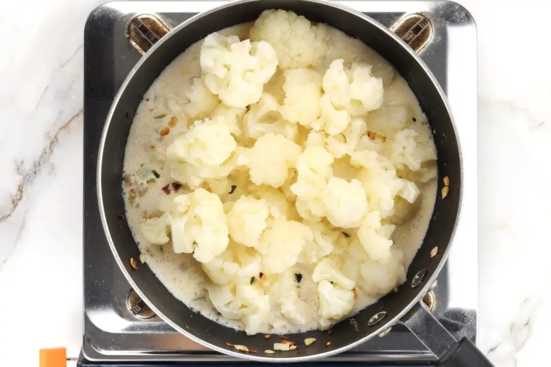Add the par boiled cauliflower