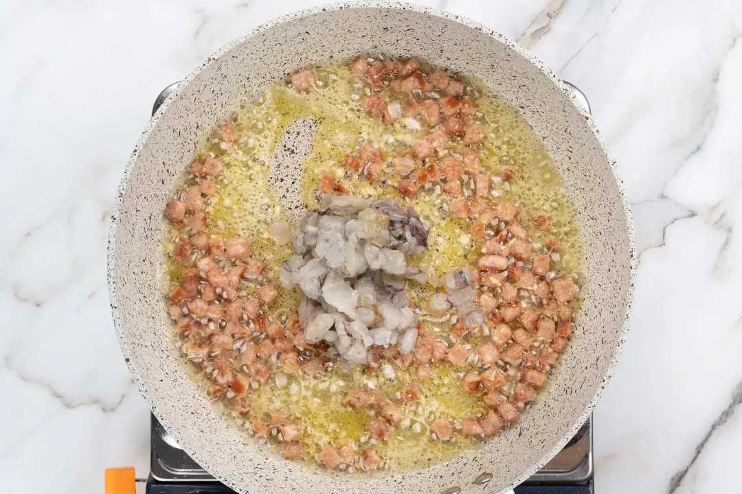 Add the shrimp to the pan for cauliflower rice