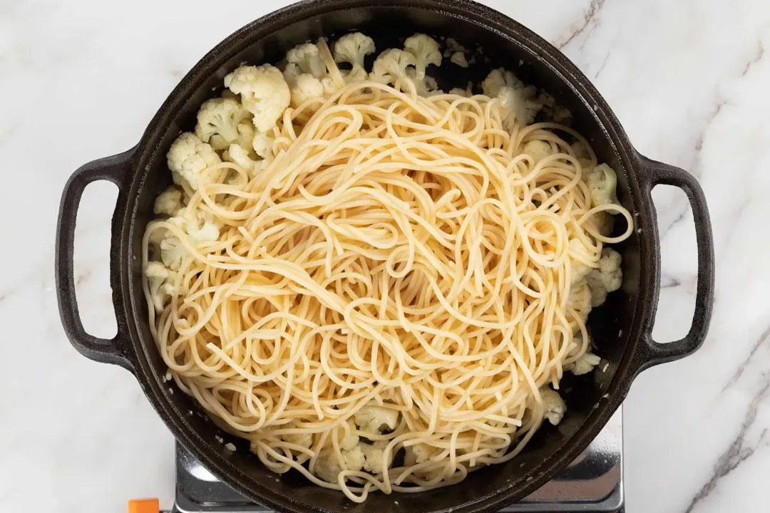 Add spaghetti and seasonings to cauliflower pasta