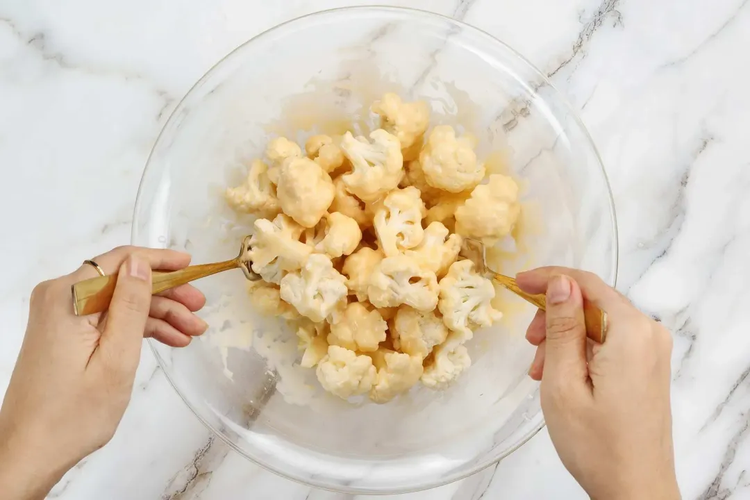 Coat the cauliflower nuggets for kung pao