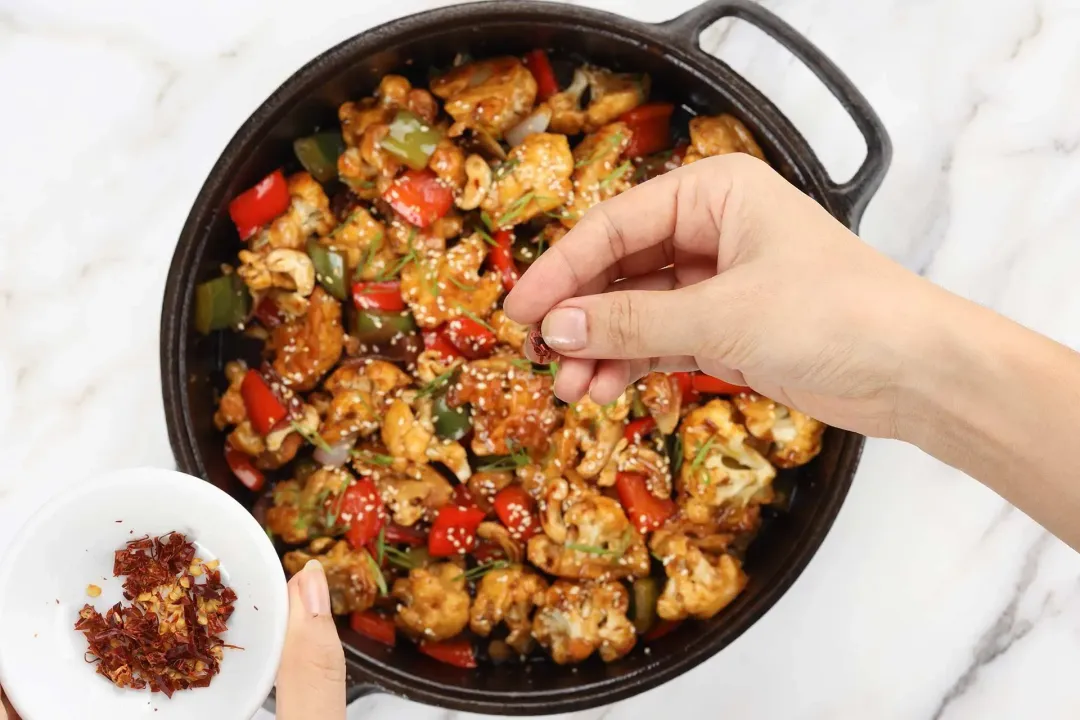 garnish and serve kung pao cauliflower