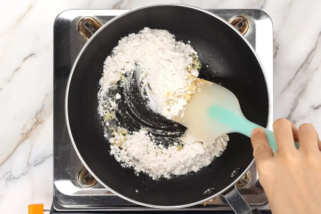 Make the cream sauce for loaded cauliflower