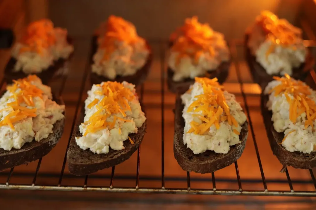 Mound the cauliflower mixture on toast Bake