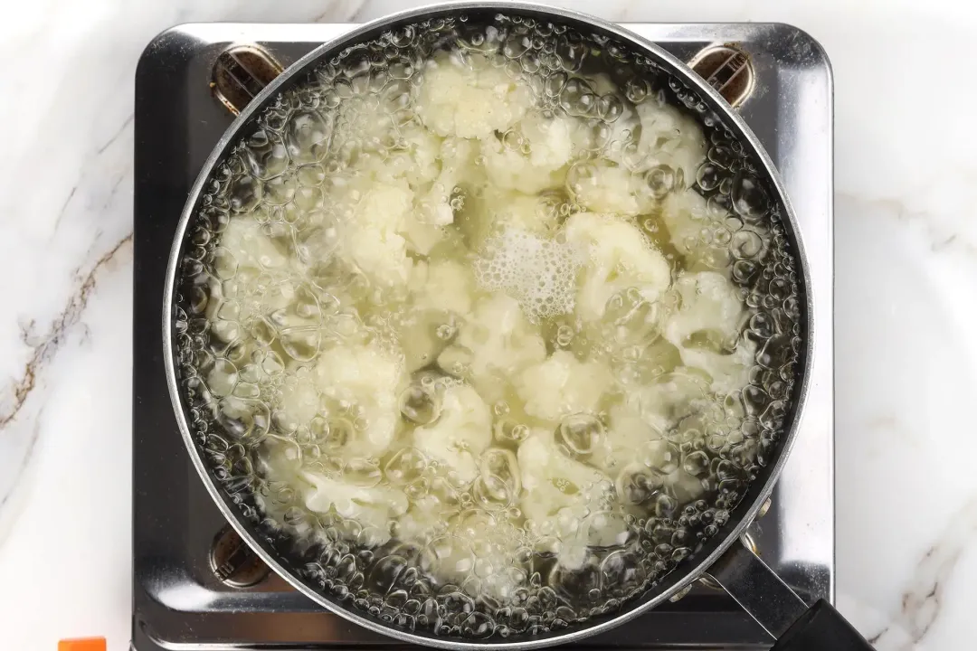 Par boil the cauliflower for soup