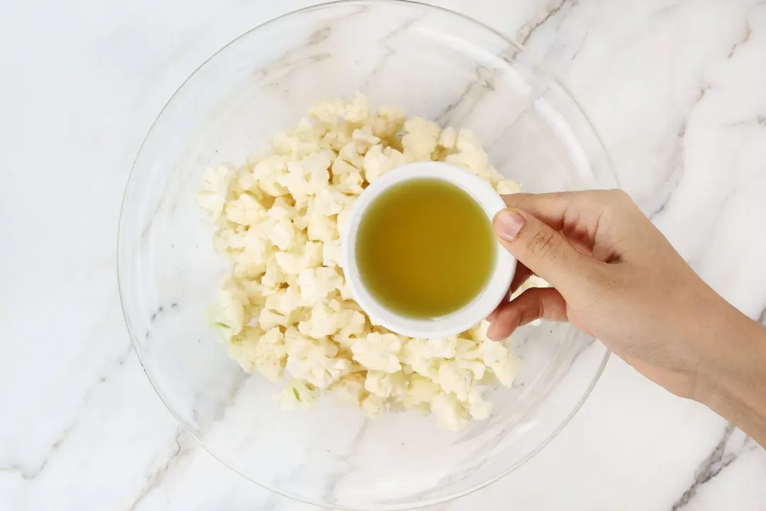 Rub the cauliflower with olive oil