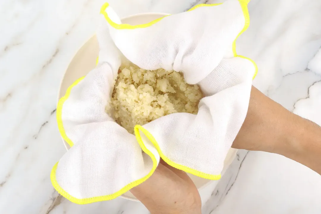 squeeze out excess liquid from the cauliflower using a cheesecloth