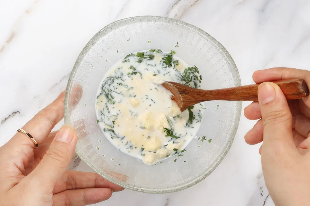 making sauce in a glass bowl