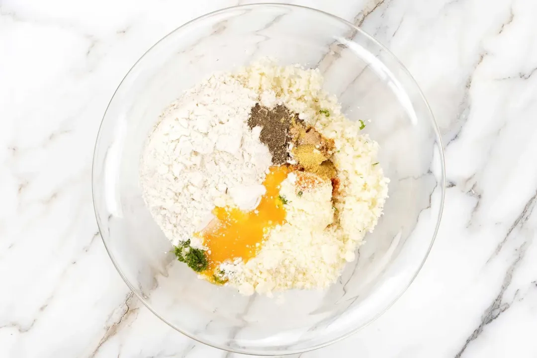 Whisk the cauliflower mixture in a large bowl