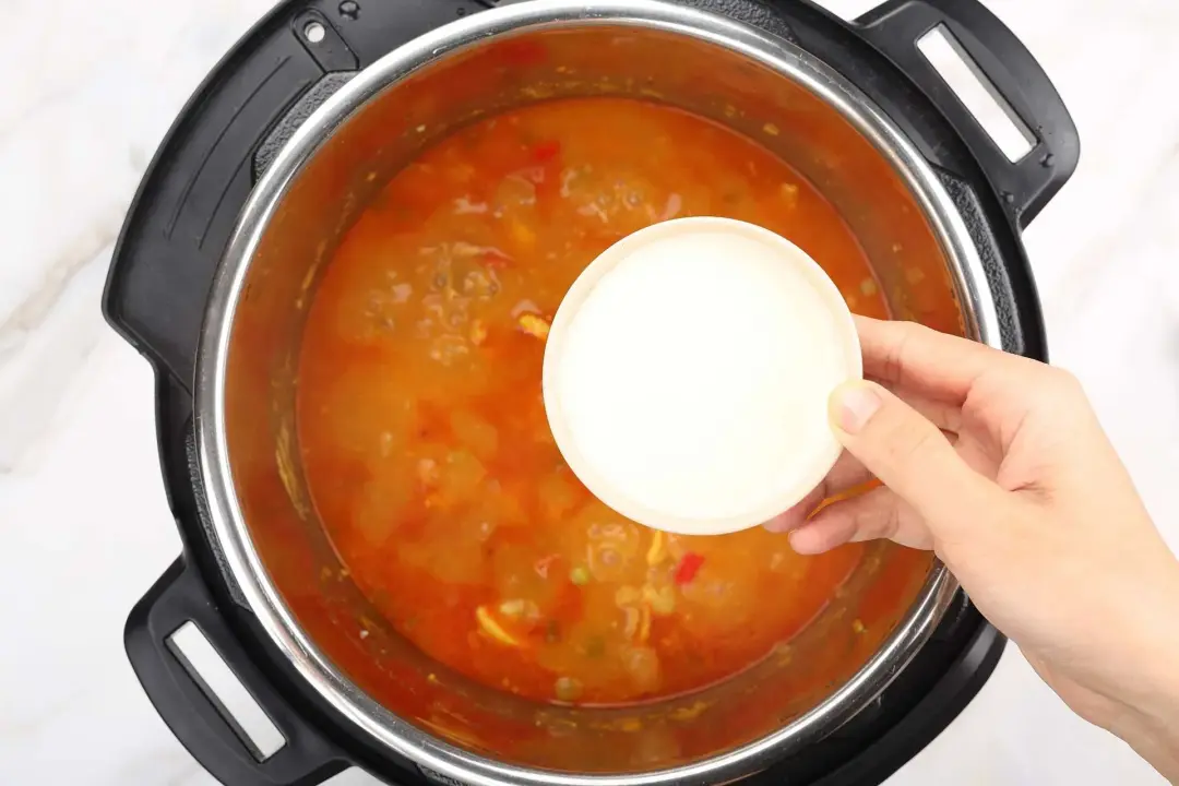 Add the cream and simmer the dish