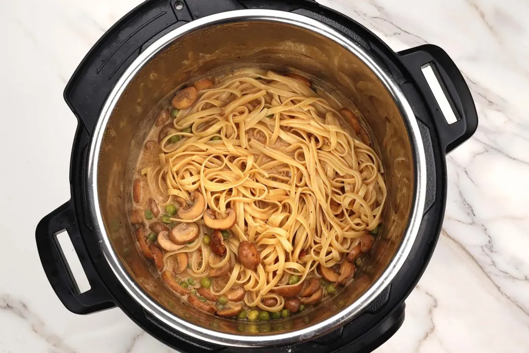 Add spaghetti to instant pot chicken breast