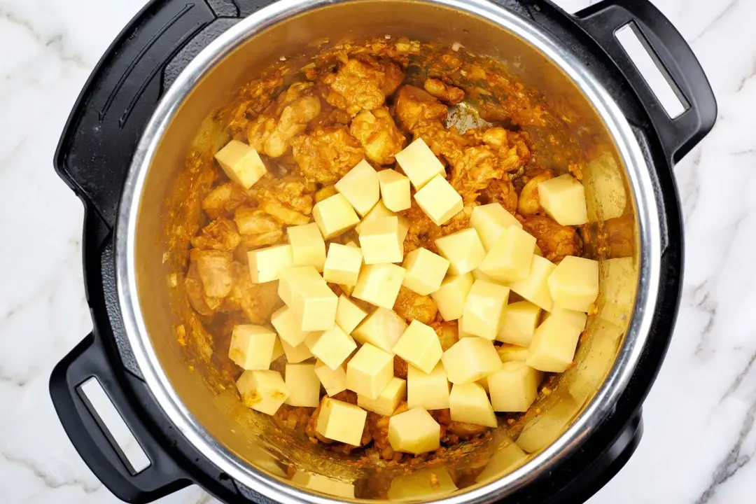 Add the vegetables for instant pot curry
