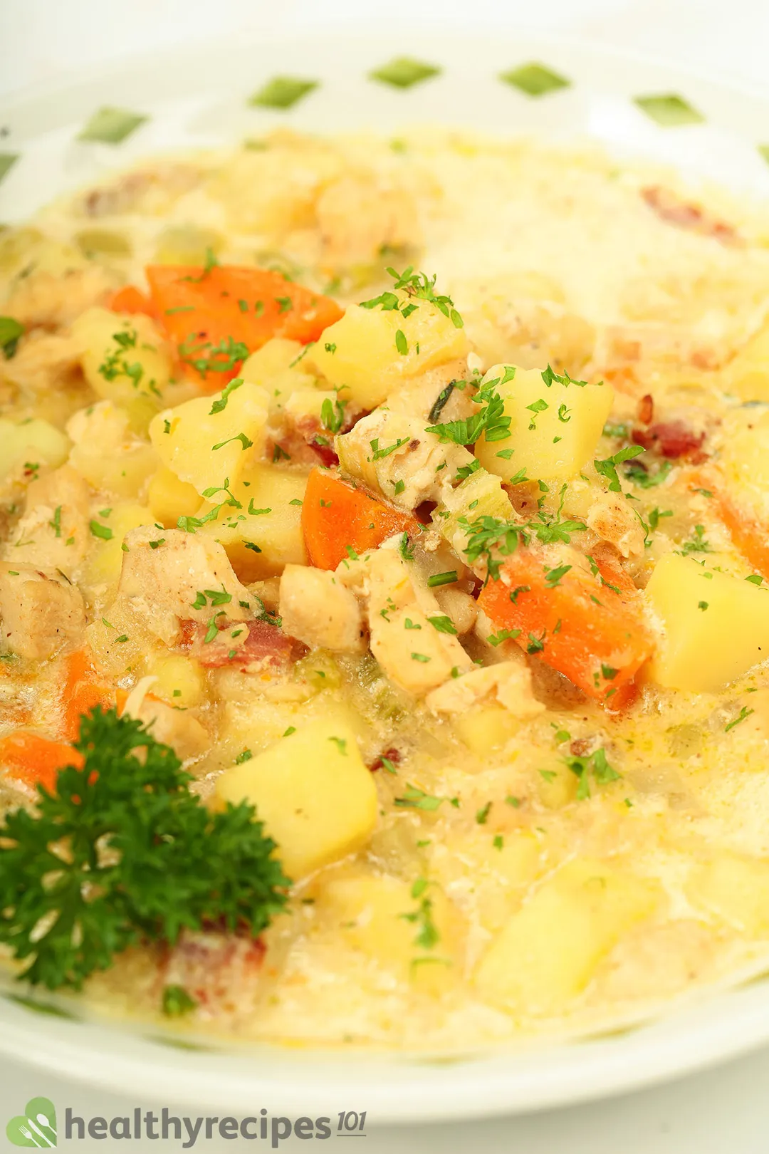 close shot of a bowl of chicken potato soup