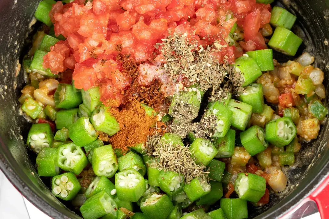 Cook the herbs and spices for gumbo