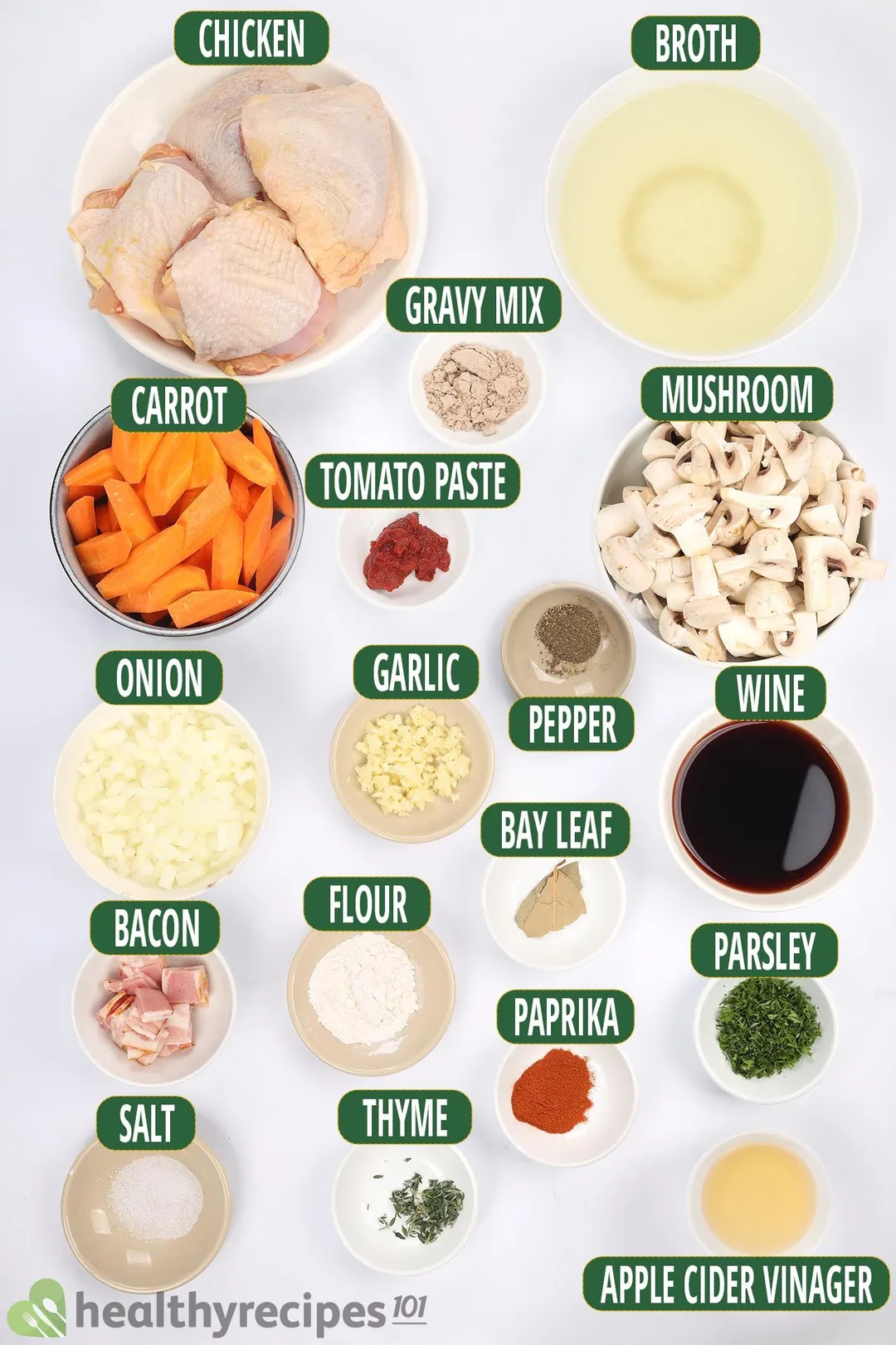 ingredients for coq au vin in bowls on a table