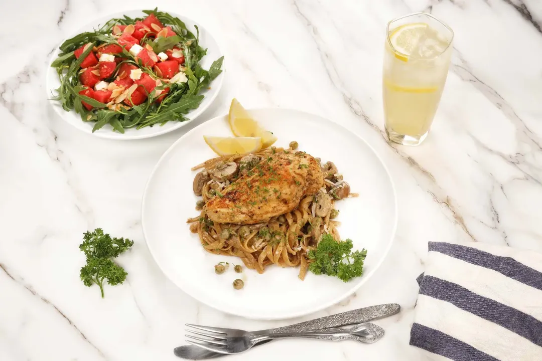 Enjoy the chicken breasts with spaghetti and mushroom sauce on the side