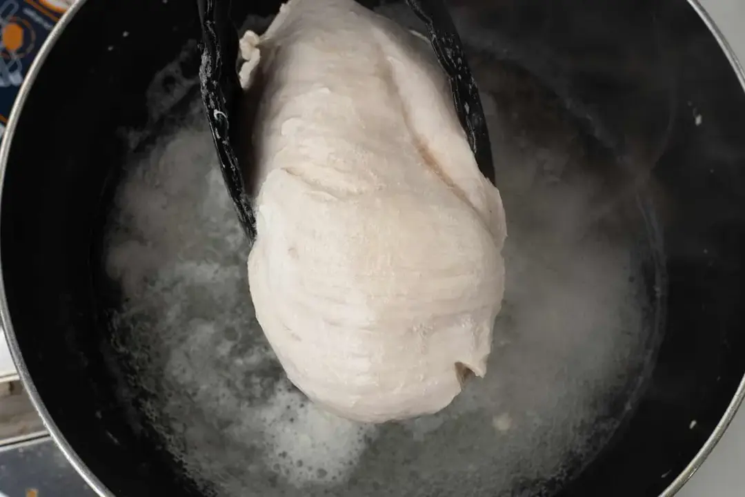 Step 1 Boil the chicken for chinese chicken salad