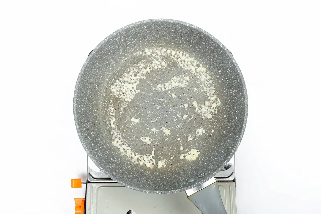Caramelized garlic in a pan