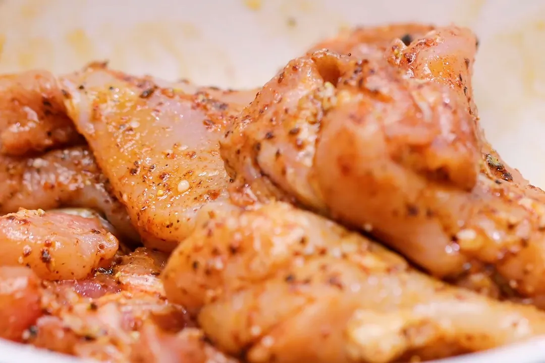 marinate chicken thighs on a plate