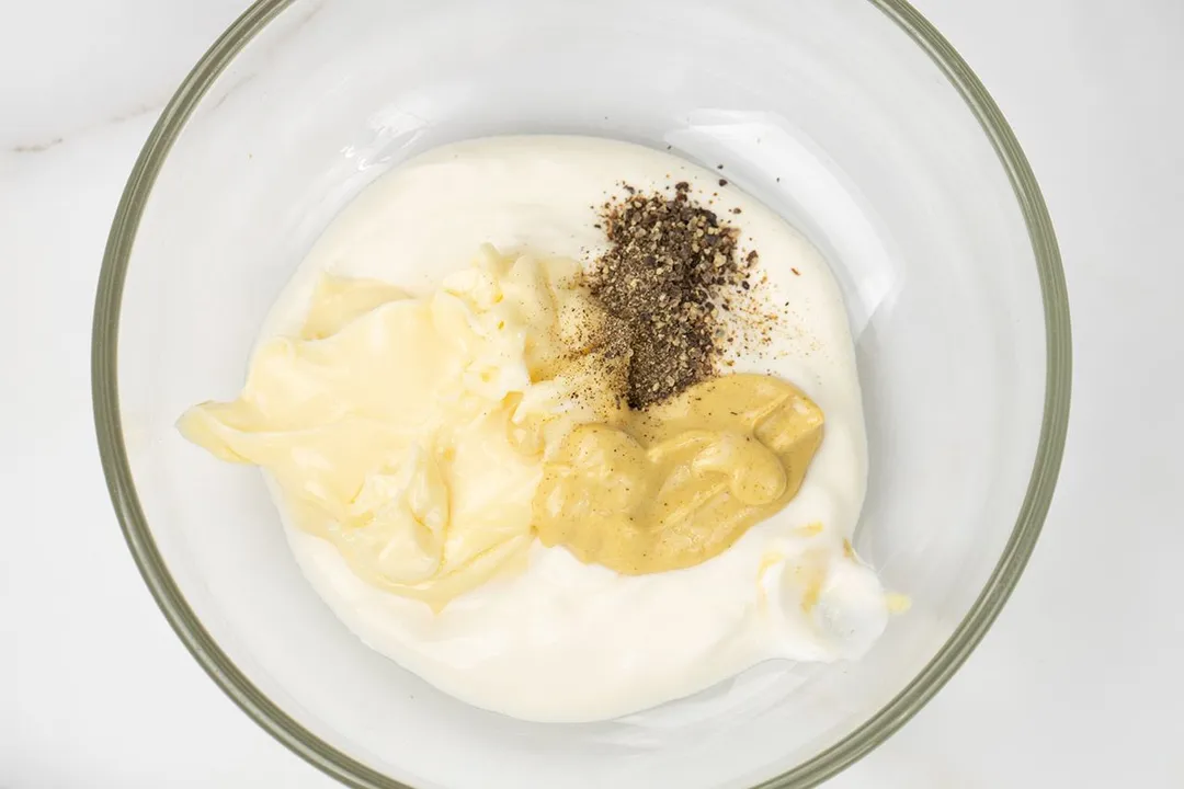 white sauce in a glass bowl