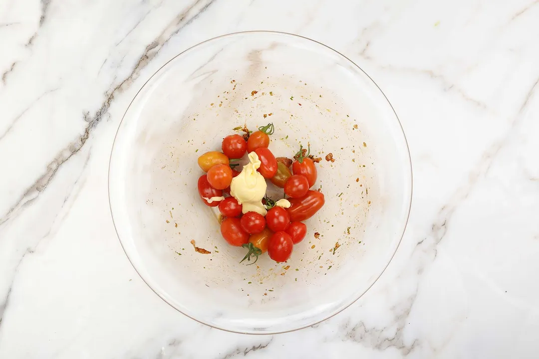 cherry tomatoes and spice in a glass bowl
