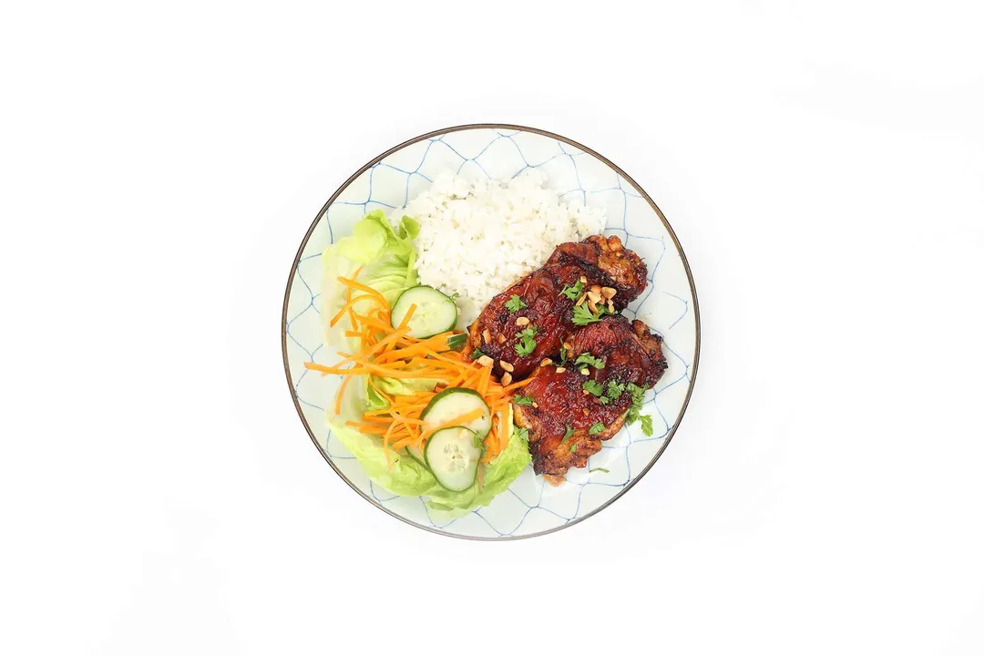 Thai chicken served with vegetables and white rice
