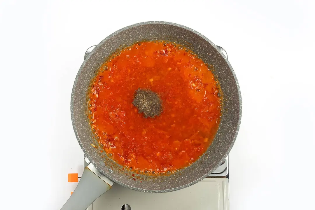 Tomato sauce being cooked in a pan