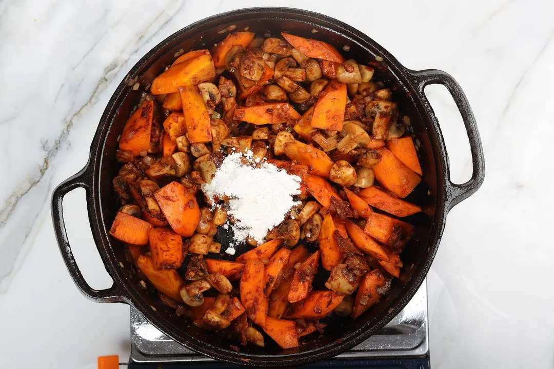 flour and carrot in cast iron skillet