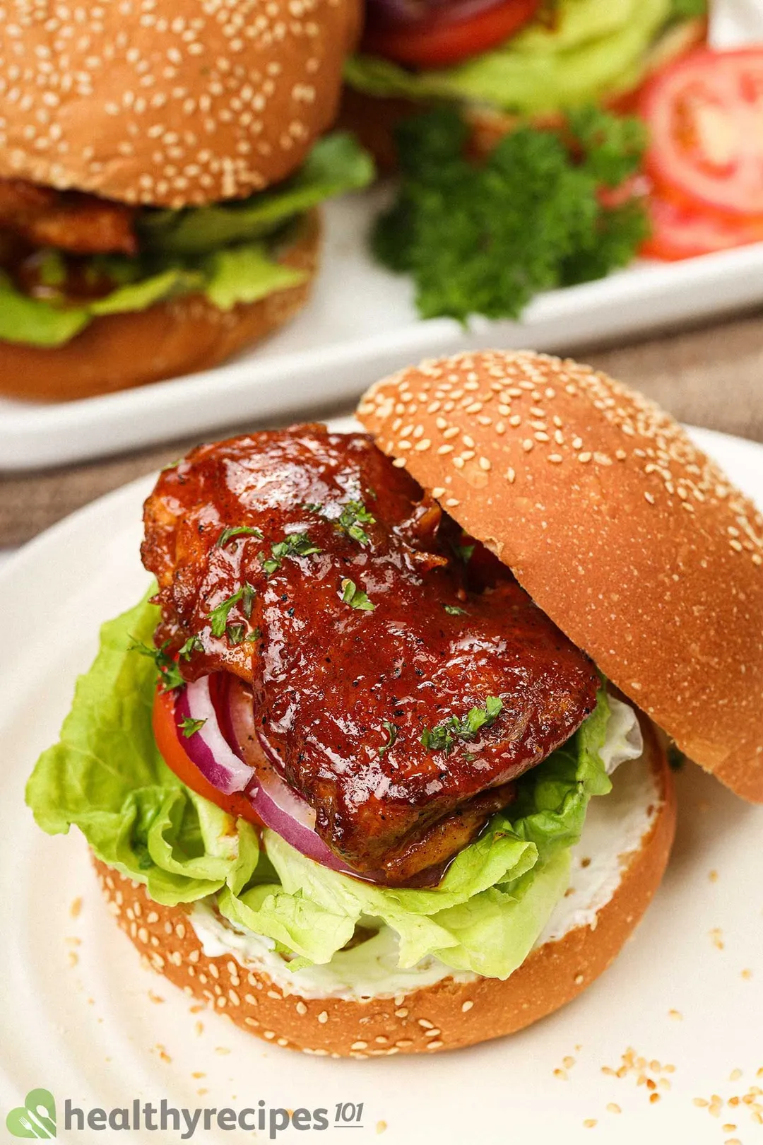 A close-up shot of a whole Buffalo chicken sandwich