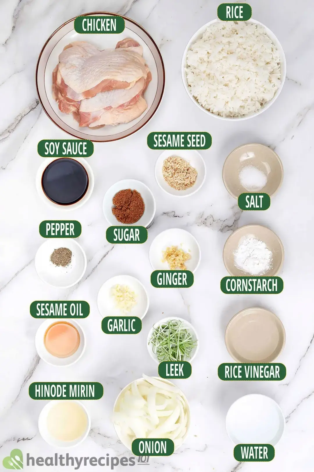 Ingredients for teriyaki chicken in different bowls: chicken thighs, cooked rice, onion, spices and seasonings