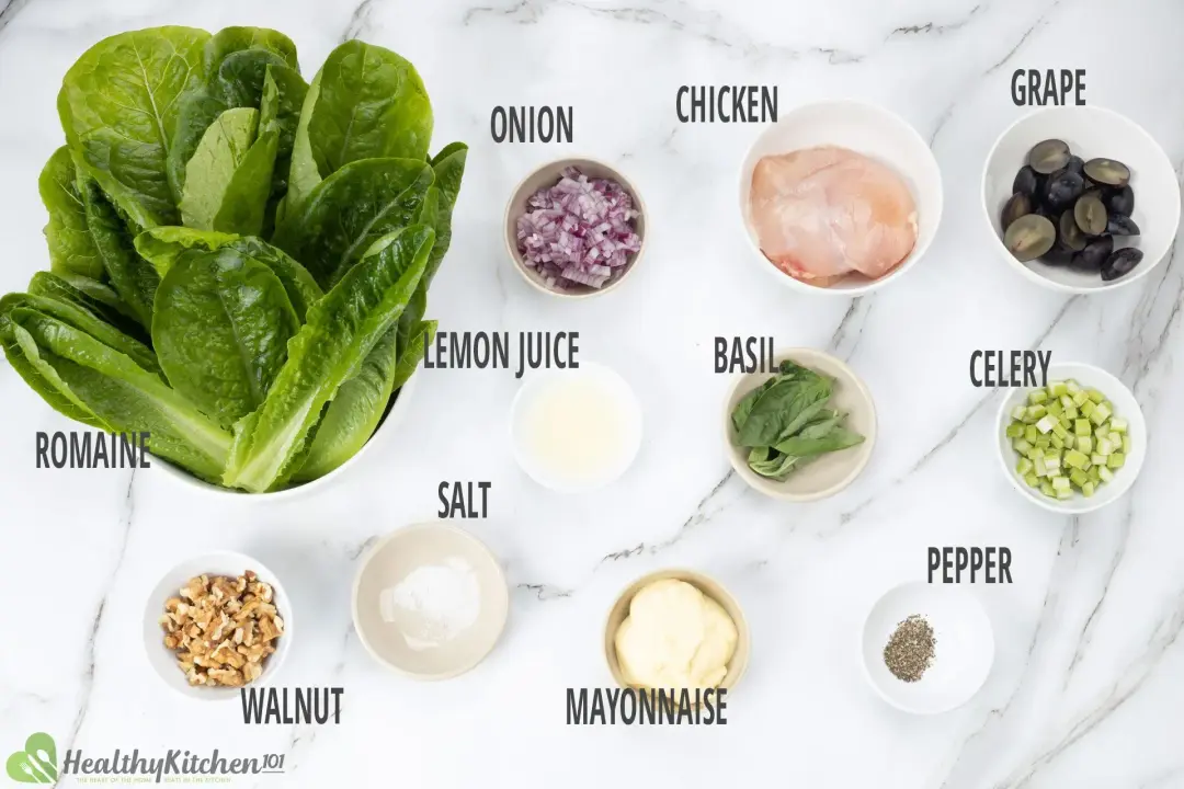 Ingredients: romaine lettuce, chicken breasts, halved grapes, chopped aromatics and dressing ingredients in separate bowls
