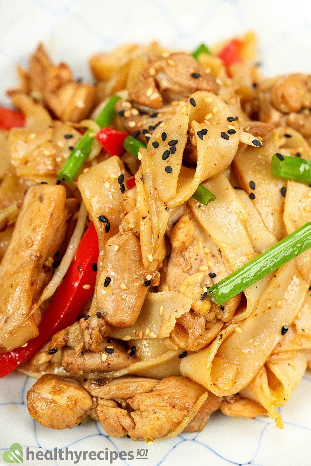 A close-up shot of a plate of chicken chow fun