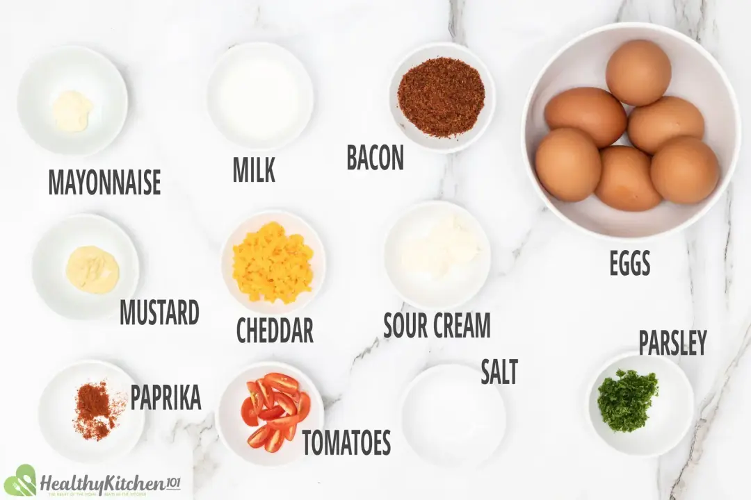Ingredients: whole eggs, cherry tomatoes, herbs and spices in separate bowls