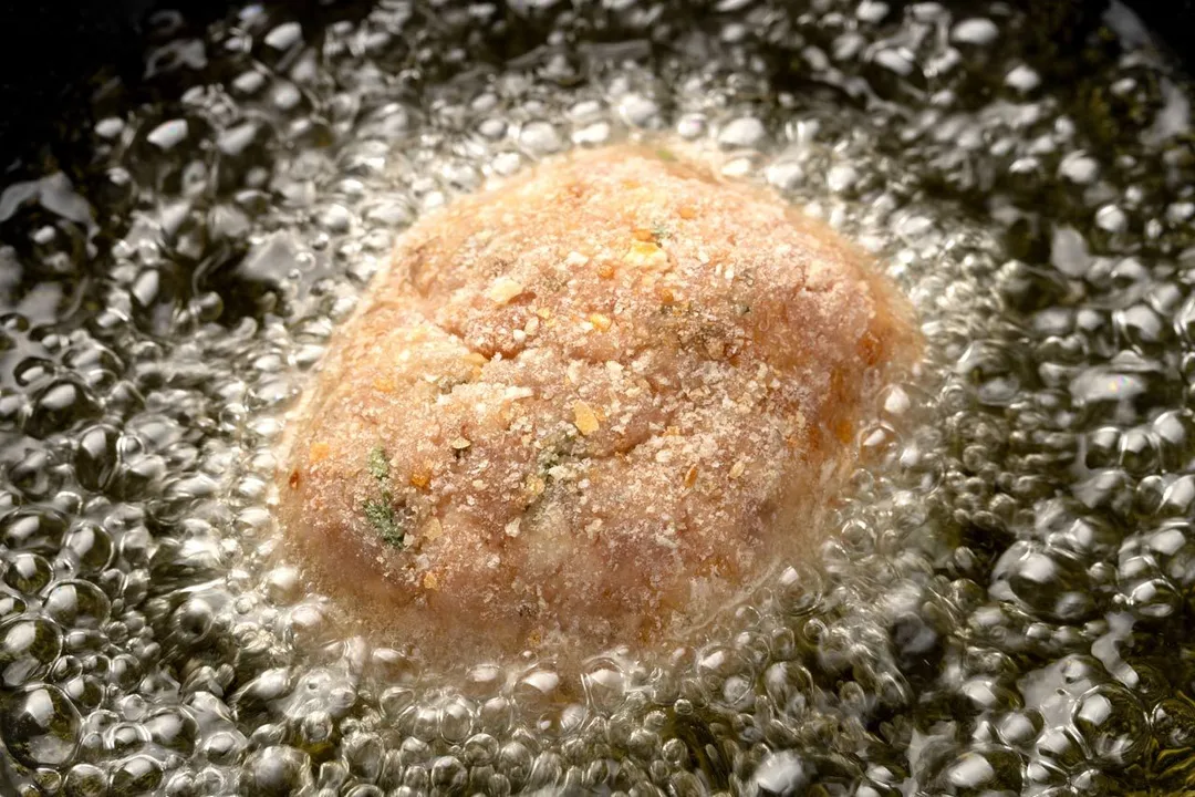 frying meatball in a skillet