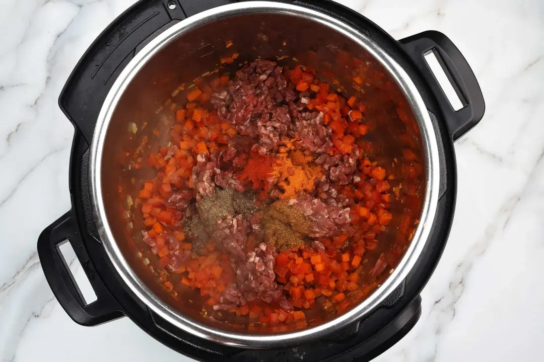 4 Add the beef and seasonings instant pot chili