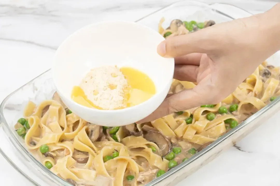 7 Mix breadcrumbs and butter to make the topping Sprinkle on top of the casserole