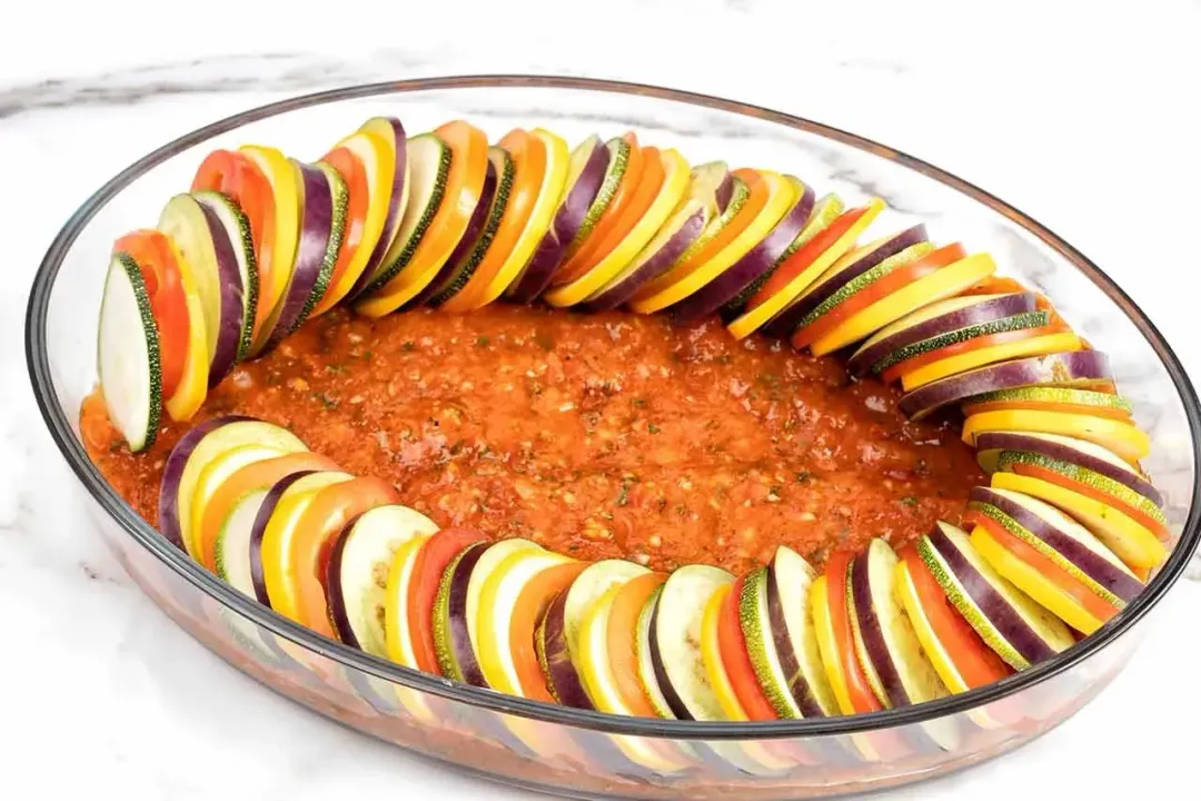 Arrange the vegetable slices in the pan ratatouille