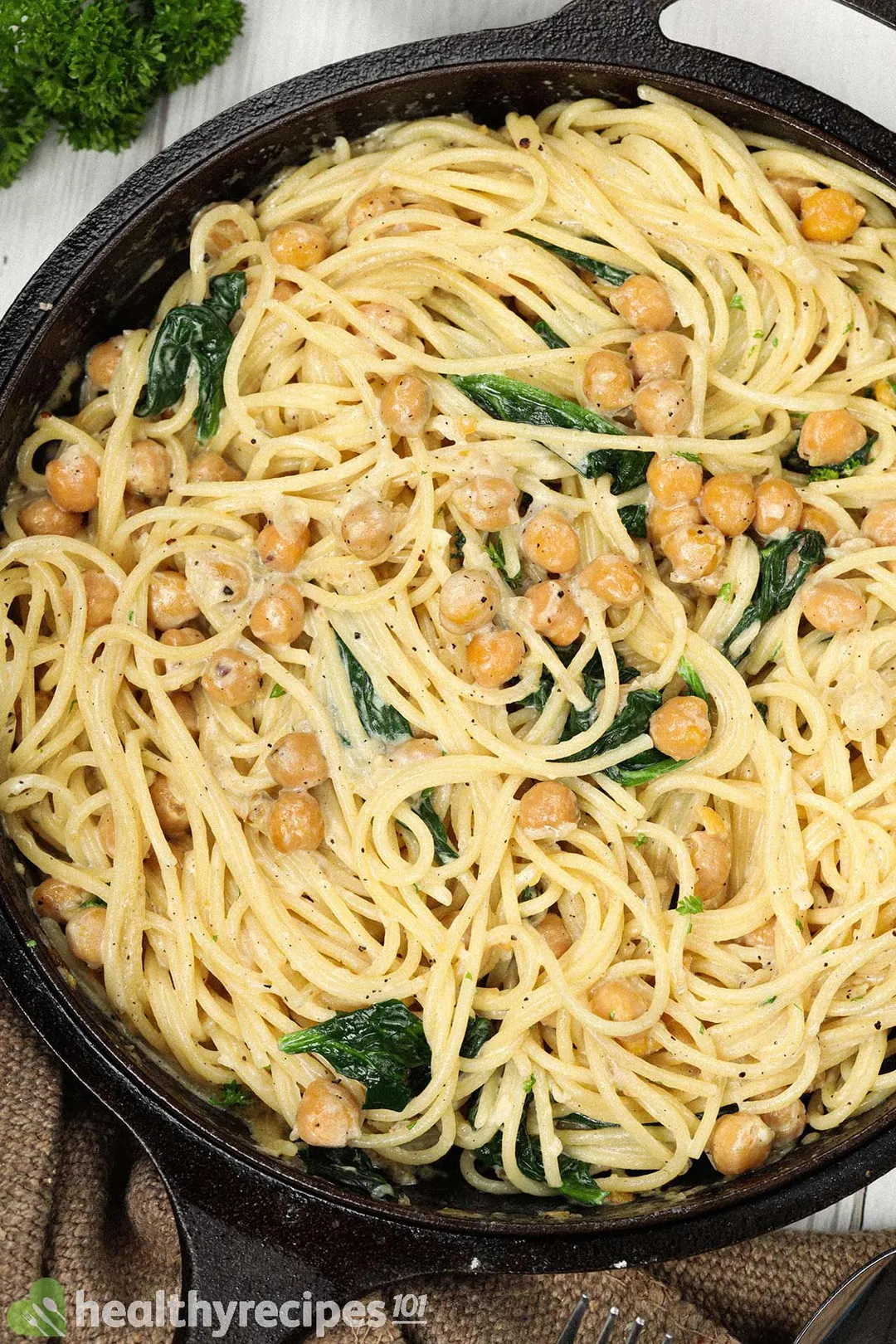 top view of a skillet of cooked pasta and chickpea