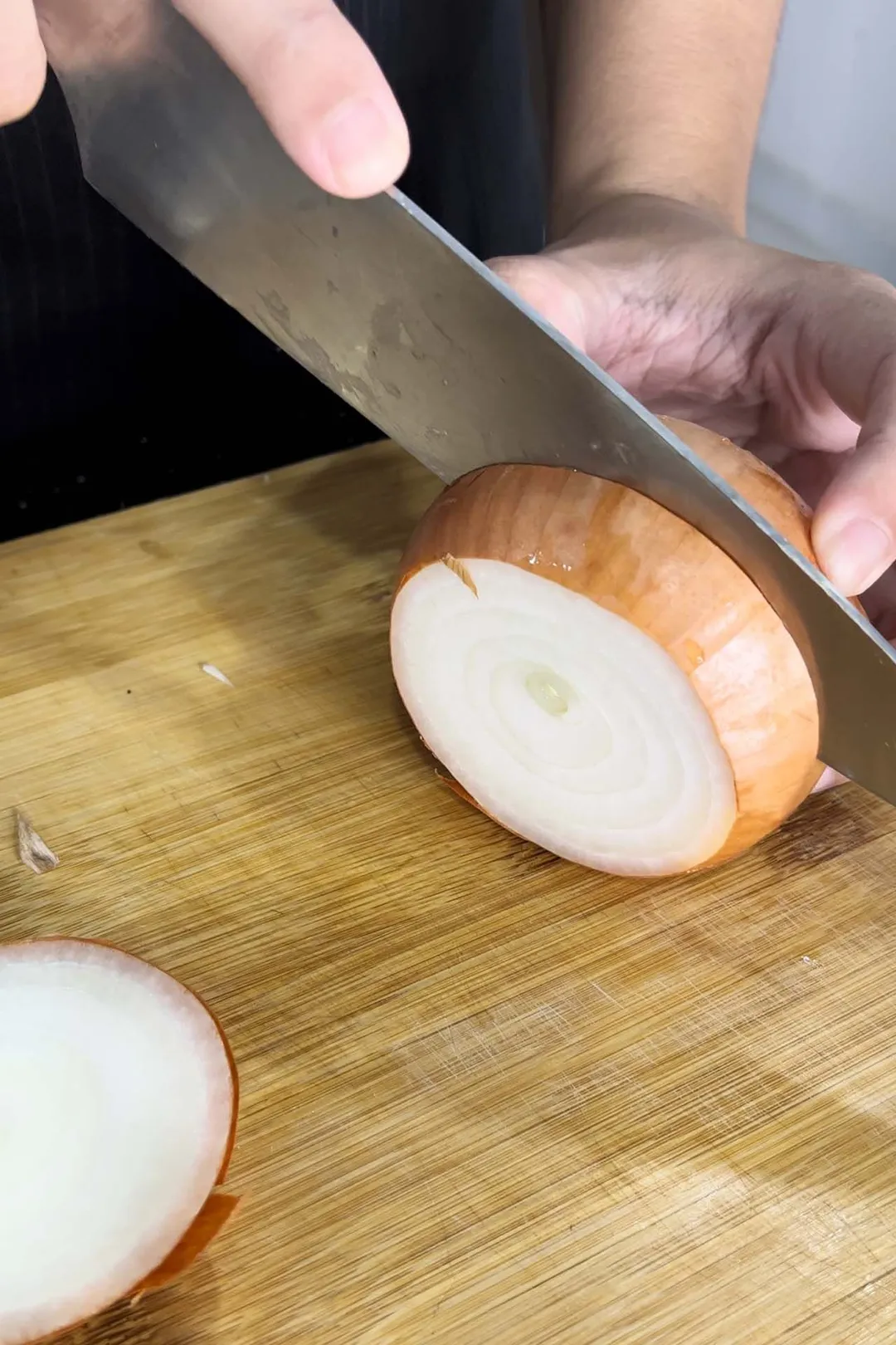 cutting onion by a knife