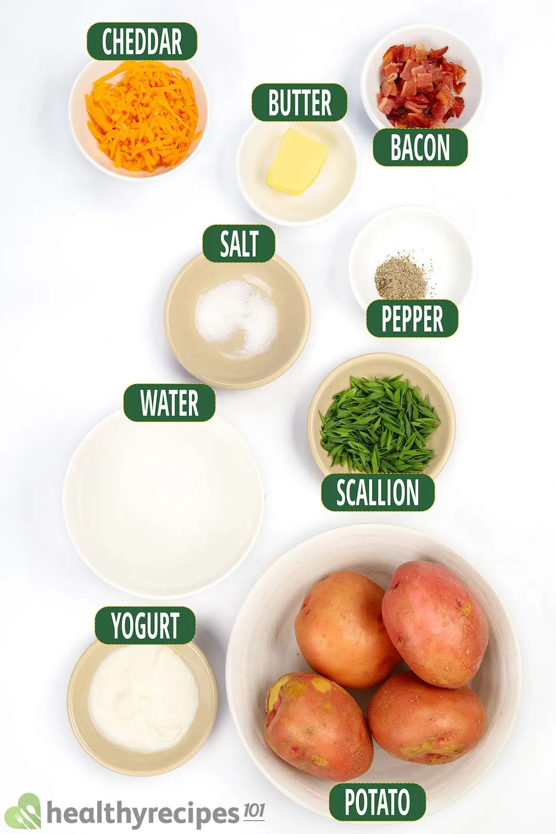ingredient bowl for baked potato in instant pot: cheddar, butter, bacon, potato,...