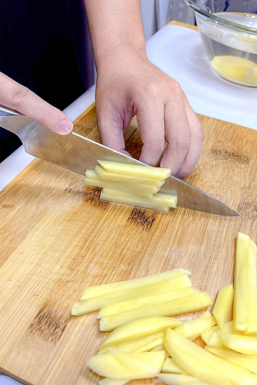 cutting potato for fries