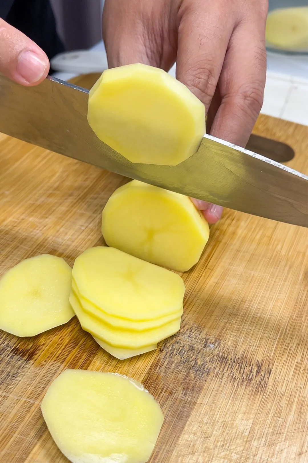 cutting potato slices