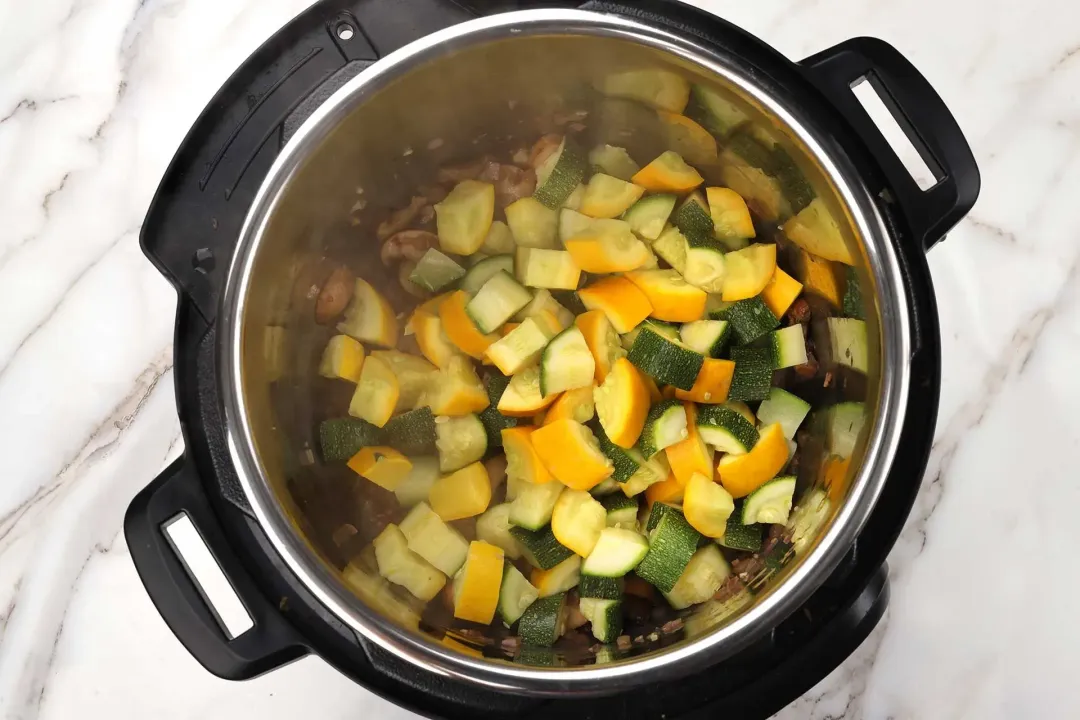 Saute zucchini with mushrooms and seasonings