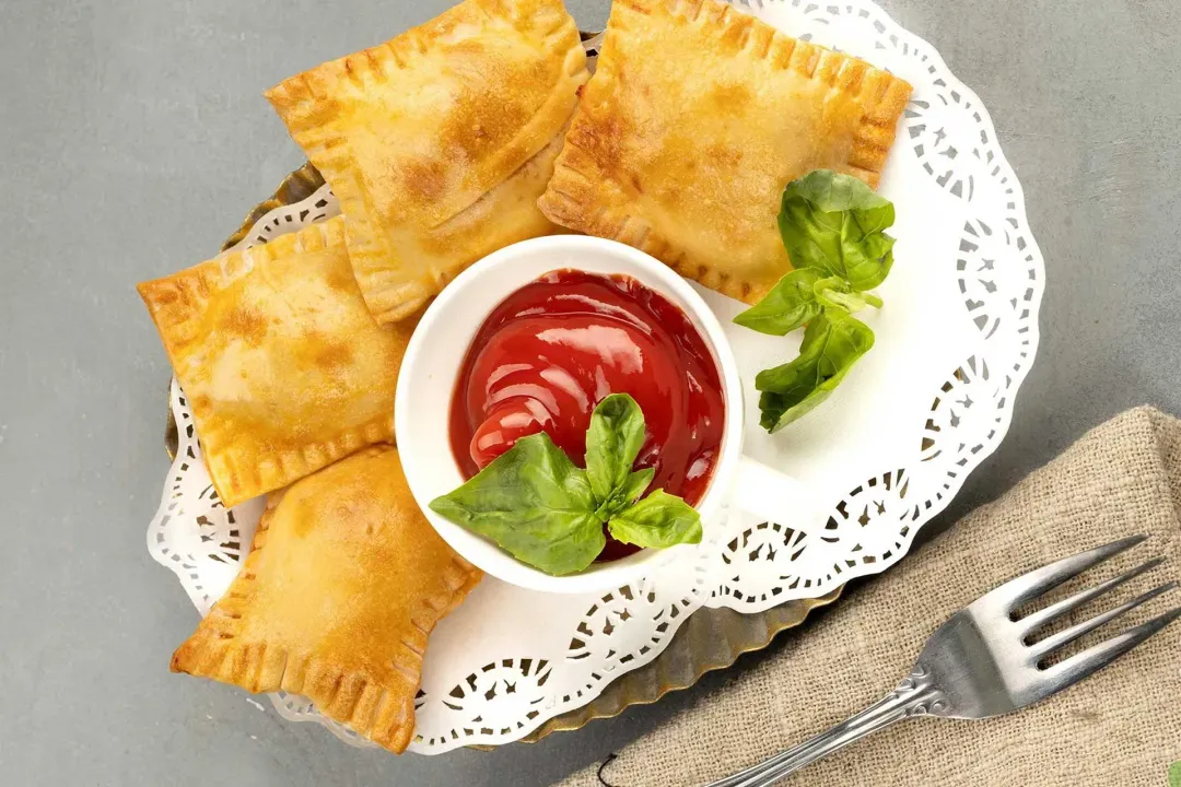 Serve pizza rolls hot with dipping sauce